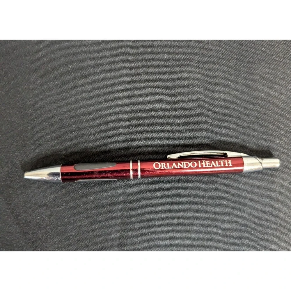 Red Metal Orlando Health Happy Doctors Day advertisement ink pen refillable